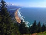 This famous view from Highway 101 overlooks the city of Manzanita, 7 miles of sandy beach, and Nehalem Bay State Park.